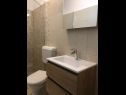 Apartmány a pokoje Mila - yard: A1(4+1), R1(2+1), R2(2) Supetarska Draga - Ostrov Rab  - Apartmán - A1(4+1): koupelna s WC