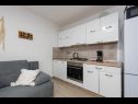 Apartmány Mil - 30 m from beach: A1(2+2), SA2 novi(0+4), SA3(0+3) Ribarica - Riviera Senj  - Apartmán - A1(2+2): kuchyně a jídelna
