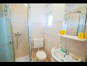 Apartmány Teo - 8m from the sea & parking: A1 žuti(4), A2 bijeli(4), A3 novi(4) Privlaka - Riviera Zadar  - Apartmán - A1 žuti(4): koupelna s WC