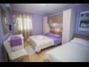 Apartmány Palmina - comfort apartment: A1 veliki (6),  A2 žuti (4+1), A3 lila (2), SA4 bijeli (2) Makarska - Riviera Makarska  - Apartmán - A1 veliki (6): ložnice