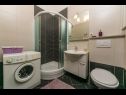 Apartmány Palmina - comfort apartment: A1 veliki (6),  A2 žuti (4+1), A3 lila (2), SA4 bijeli (2) Makarska - Riviera Makarska  - Apartmán -  A2 žuti (4+1): koupelna s WC