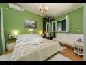 Apartmány Palmina - comfort apartment: A1 veliki (6),  A2 žuti (4+1), A3 lila (2), SA4 bijeli (2) Makarska - Riviera Makarska  - Apartmán -  A2 žuti (4+1): ložnice