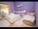 Apartmány Palmina - comfort apartment: A1 veliki (6),  A2 žuti (4+1), A3 lila (2), SA4 bijeli (2) Makarska - Riviera Makarska  - Apartmán - A3 lila (2): ložnice