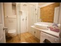 Apartmány Palmina - comfort apartment: A1 veliki (6),  A2 žuti (4+1), A3 lila (2), SA4 bijeli (2) Makarska - Riviera Makarska  - Apartmán - A3 lila (2): koupelna s WC