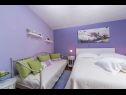 Apartmány Palmina - comfort apartment: A1 veliki (6),  A2 žuti (4+1), A3 lila (2), SA4 bijeli (2) Makarska - Riviera Makarska  - Studio apartmán - SA4 bijeli (2): ložnice