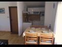Apartmány a pokoje Ognjen- family apartments with free parking A1(2+2), SA3(2), R1(2), A5 (4+2) Betina - Ostrov Murter  - Apartmán - A1(2+2): kuchyně a jídelna