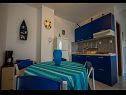 Apartmány Daju - 3 colours: A1 plavi(2+2), A2 žuti(4+1), A3 narančasti(2) Ždrelac - Ostrov Pašman  - Apartmán - A1 plavi(2+2): kuchyně a jídelna