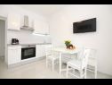 Apartmány Anamarija - garden terrace : A1(4) Split - Riviera Split  - Apartmán - A1(4): kuchyně a jídelna